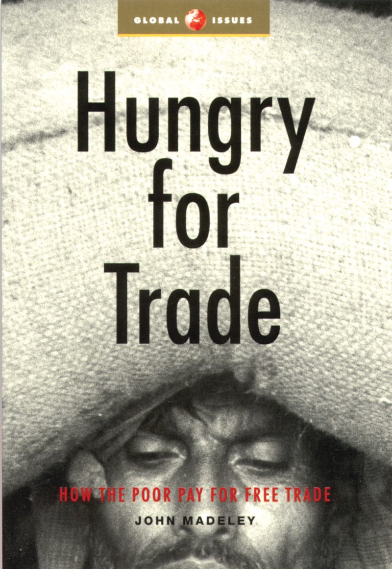 Book cover titled "Hungry for Trade" by John Madeley, featuring a close-up black and white photograph of a person's face looking downward, addressing free trade and poverty.