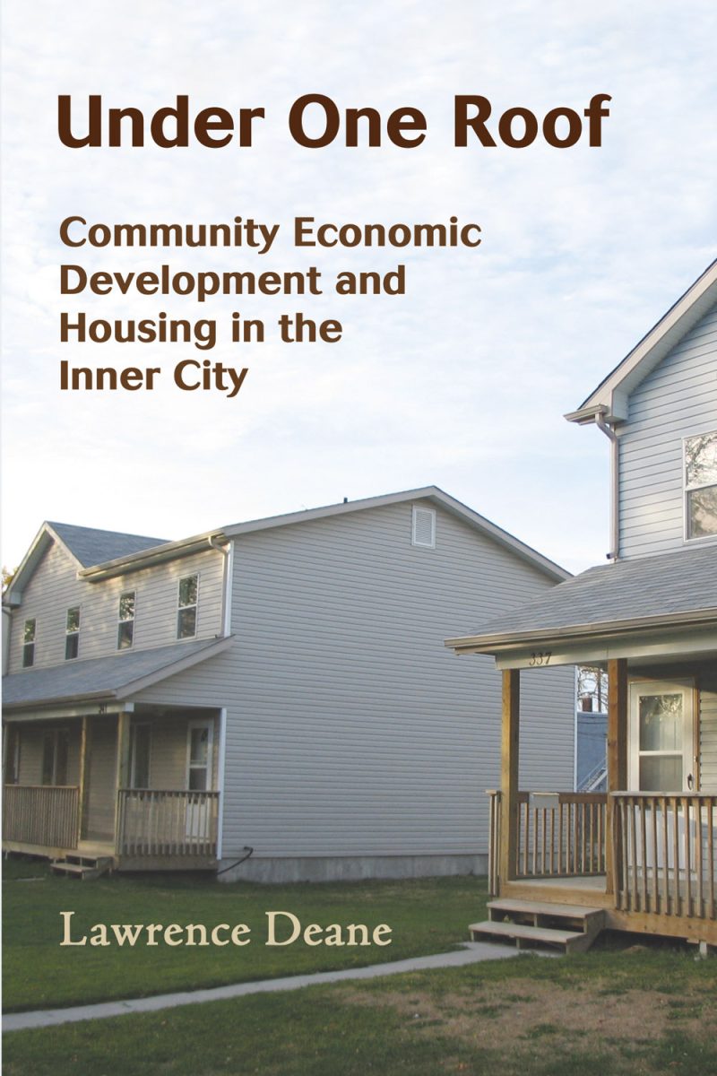 Book cover showing two light blue houses with porches and green lawn, titled "Under One Roof" by Lawrence Deane.