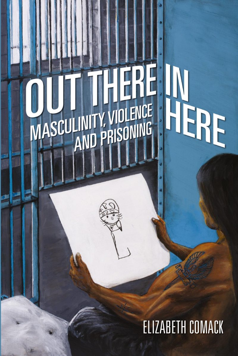 Book cover for "Out There In Here" by Elizabeth Comack featuring a person holding a drawing against a blue wall with prison bars.