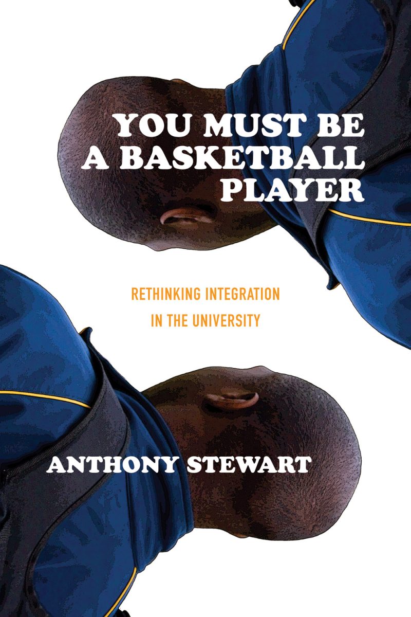 Book cover showing basketball players' heads and shoulders with blue jerseys against white background, titled "You Must Be a Basketball Player" by Anthony Stewart.