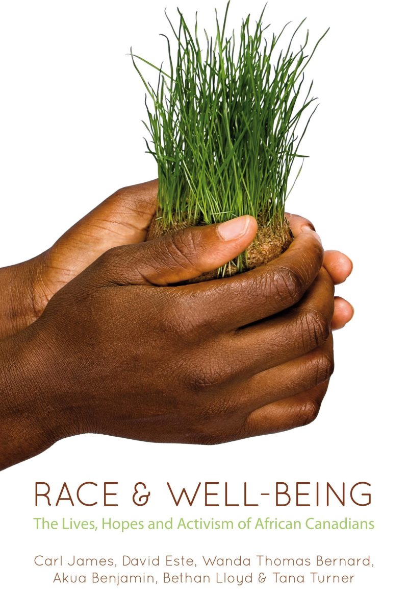 Hands holding grass and soil with book title "Race & Well-Being: The Lives, Hopes and Activism of African Canadians"