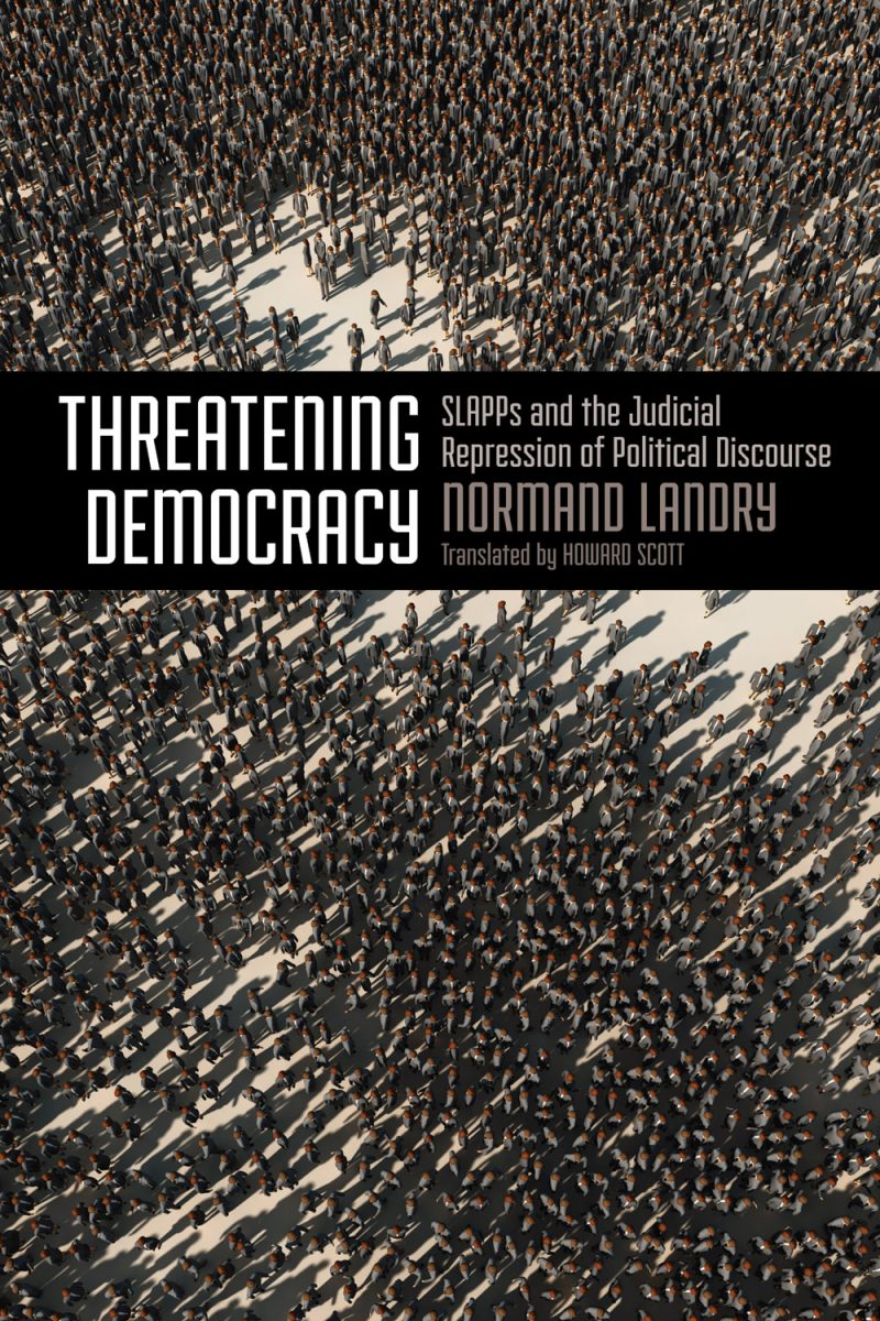 Book cover of "Threatening Democracy" by Normand Latory, showing an aerial view of a large crowd of people gathered in a public space.