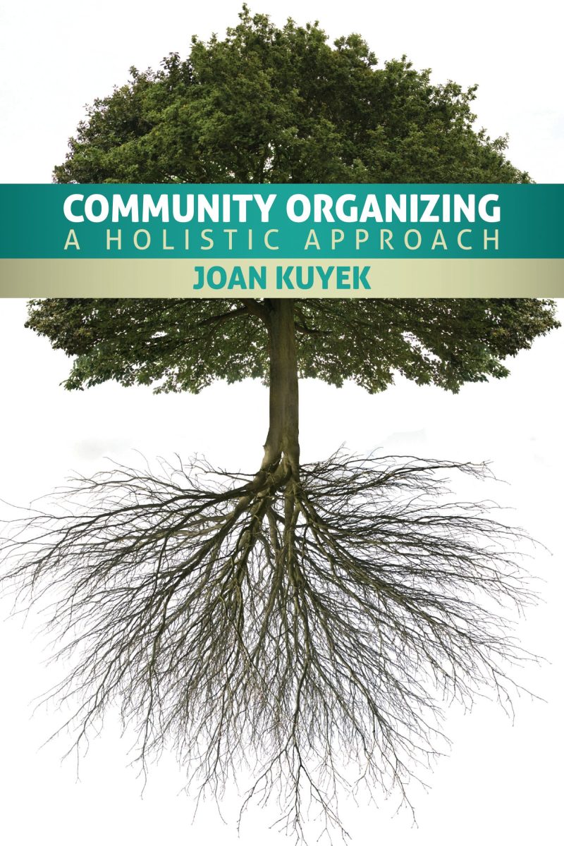 Book cover showing a tree with visible roots, titled "Community Organizing: A Holistic Approach" by Joan Kuyek.