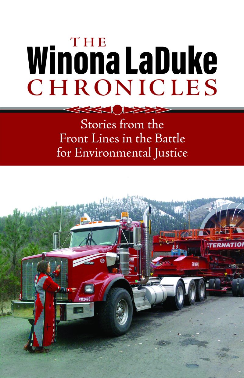 Book cover for "The Winona LaDuke Chronicles" featuring a red truck and person at a mountain logging site.