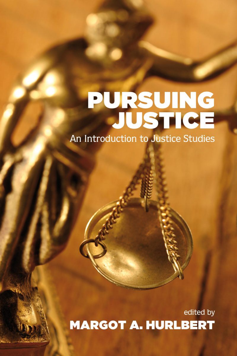 Book cover for "Pursuing Justice: An Introduction to Justice Studies" edited by Margot A. Hurlbert, featuring a golden Lady Justice statue with scales.