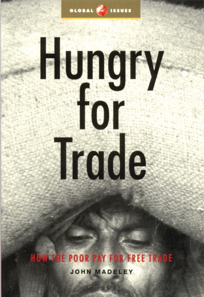 Book cover titled "Hungry for Trade" by John Madeley, featuring a close-up black and white photograph of a person's face looking downward, addressing free trade and poverty.