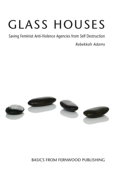Book cover for "Glass Houses" by Rebekkah Adams with four black stones on white background.