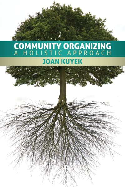 Book cover showing a tree with visible roots, titled "Community Organizing: A Holistic Approach" by Joan Kuyek.