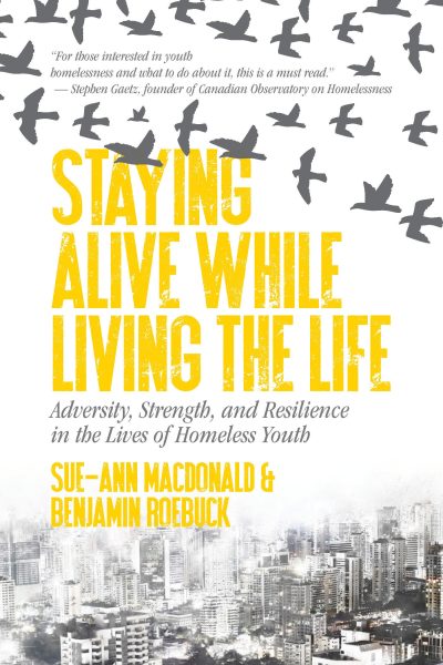 Book cover for "Staying Alive While Living the Life" by Sue-Ann MacDonald and Benjamin Roebuck about resilience in homeless youth.