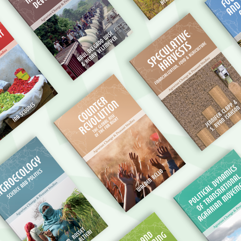 Collection of academic books arranged on a white surface, displaying titles about agriculture, food systems, and environmental topics.