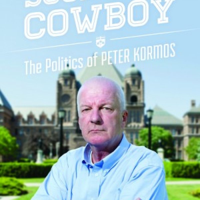 Book cover for "Socialist Cowboy: The Politics of Peter Kormos" by Larry Savage, featuring a person in a blue shirt.